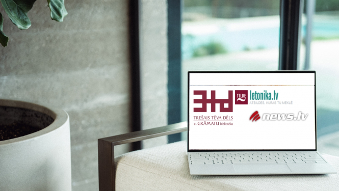 Uz baltas virsmas atvērts klēpjdators ar e-resursu logo ekrānā