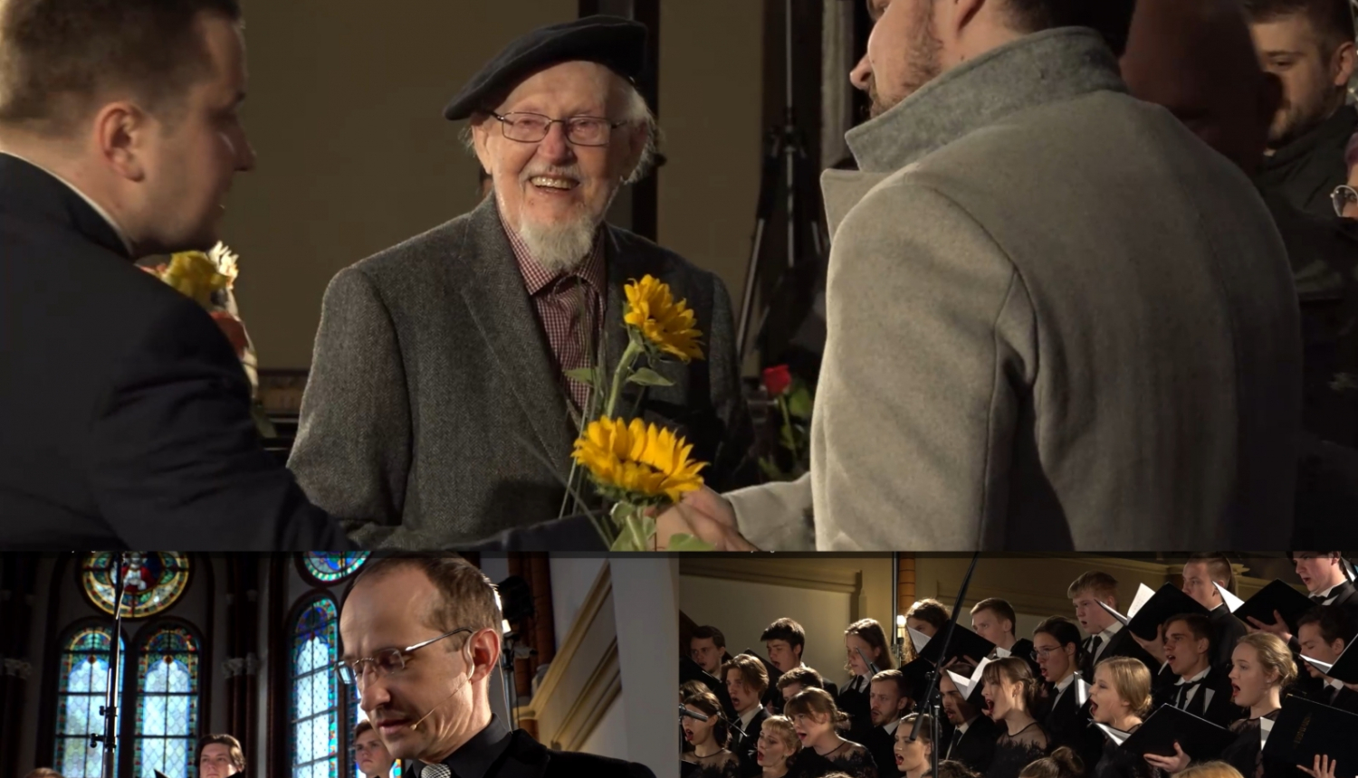 Epizodes no koncerta  "Amao Omi" Rīgas Domā - Knuts Skujenieks ar ziediem, aktieris Kaspars Znotiņš deklamē dzeju, koris izpilda dziesmu